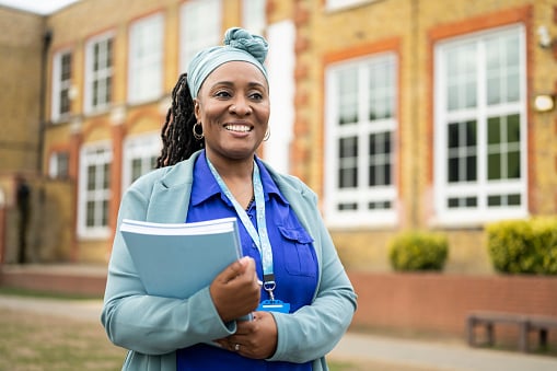 Teacher Outside of a School